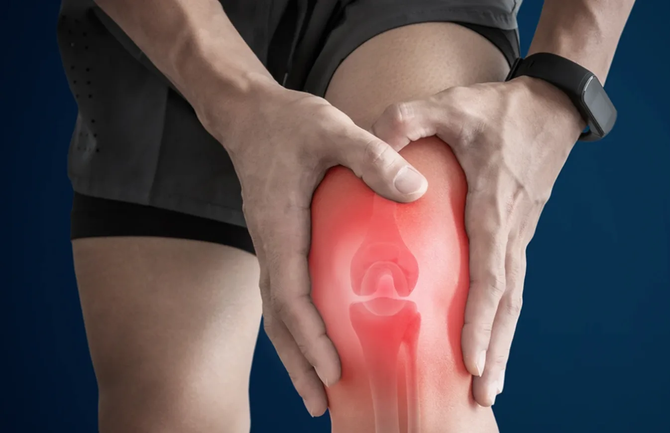 Knee anatomy with red inflammation highlighted. Comprehensive guide to anterior knee pain types, causes and evidence-based management techniques.