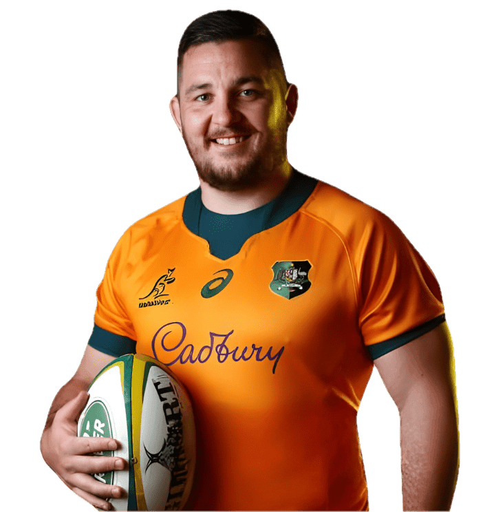 Rugby player in orange jersey holding ball.