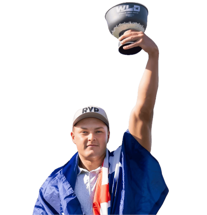 Person celebrating with trophy raised high.