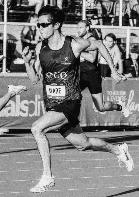 Athlete sprinting on a track.